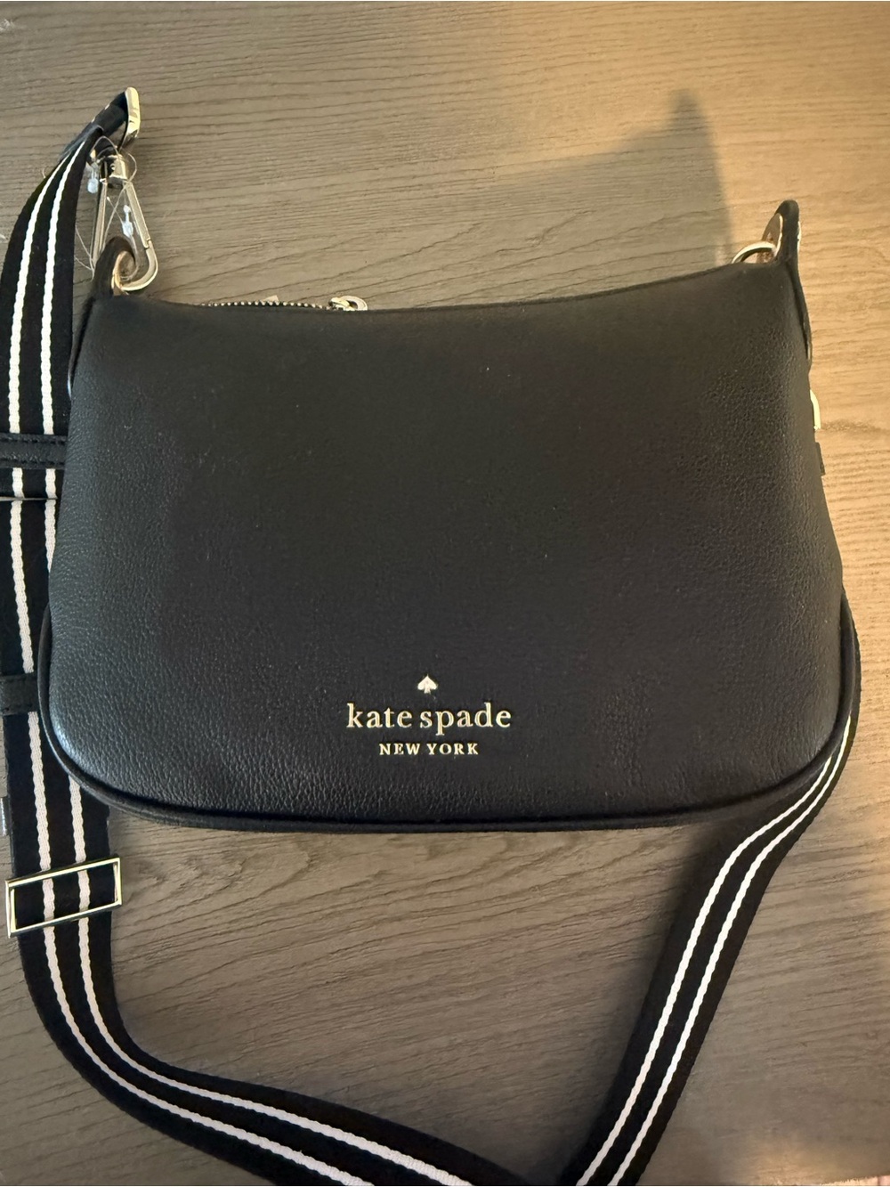 kate spade black leather shoulder pouch with gold hardware